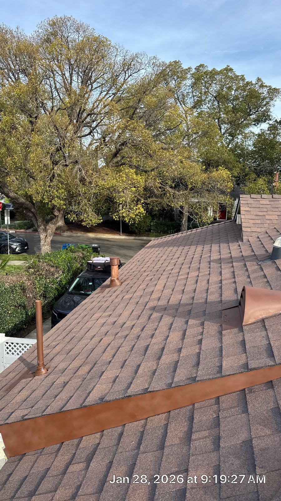 Asphalt shingle roof with copper pipe vents and flashing | Roof Replacement Inc Asphalt shingle roof with copper pipe vents and flashing — Roof Replacement Inc