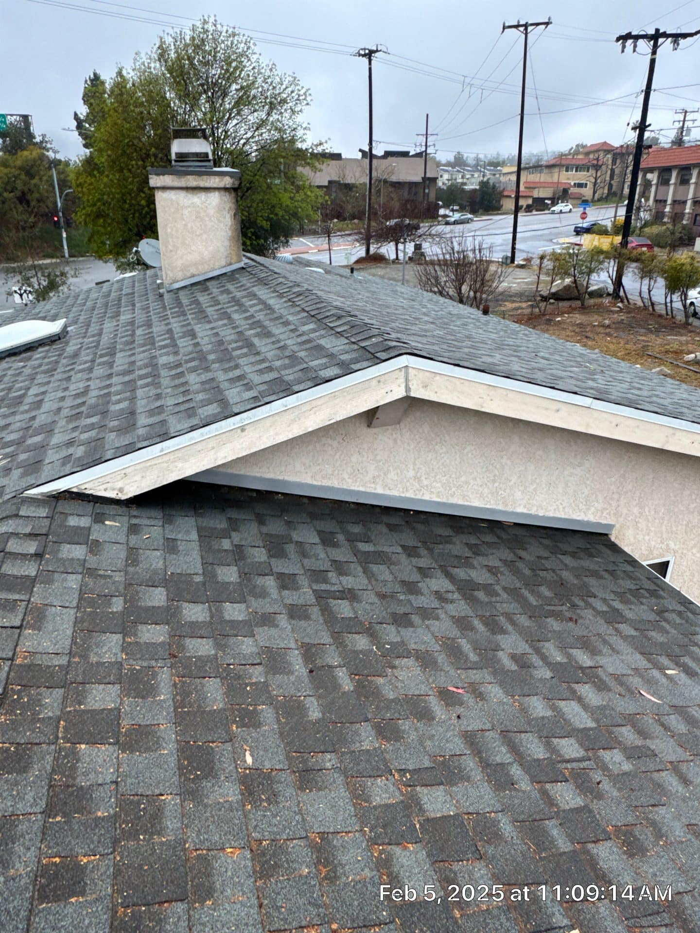 gray asphalt shingle roof with chimney and metal drip edge — La Crescenta-Montrose — Roof Replacement Inc