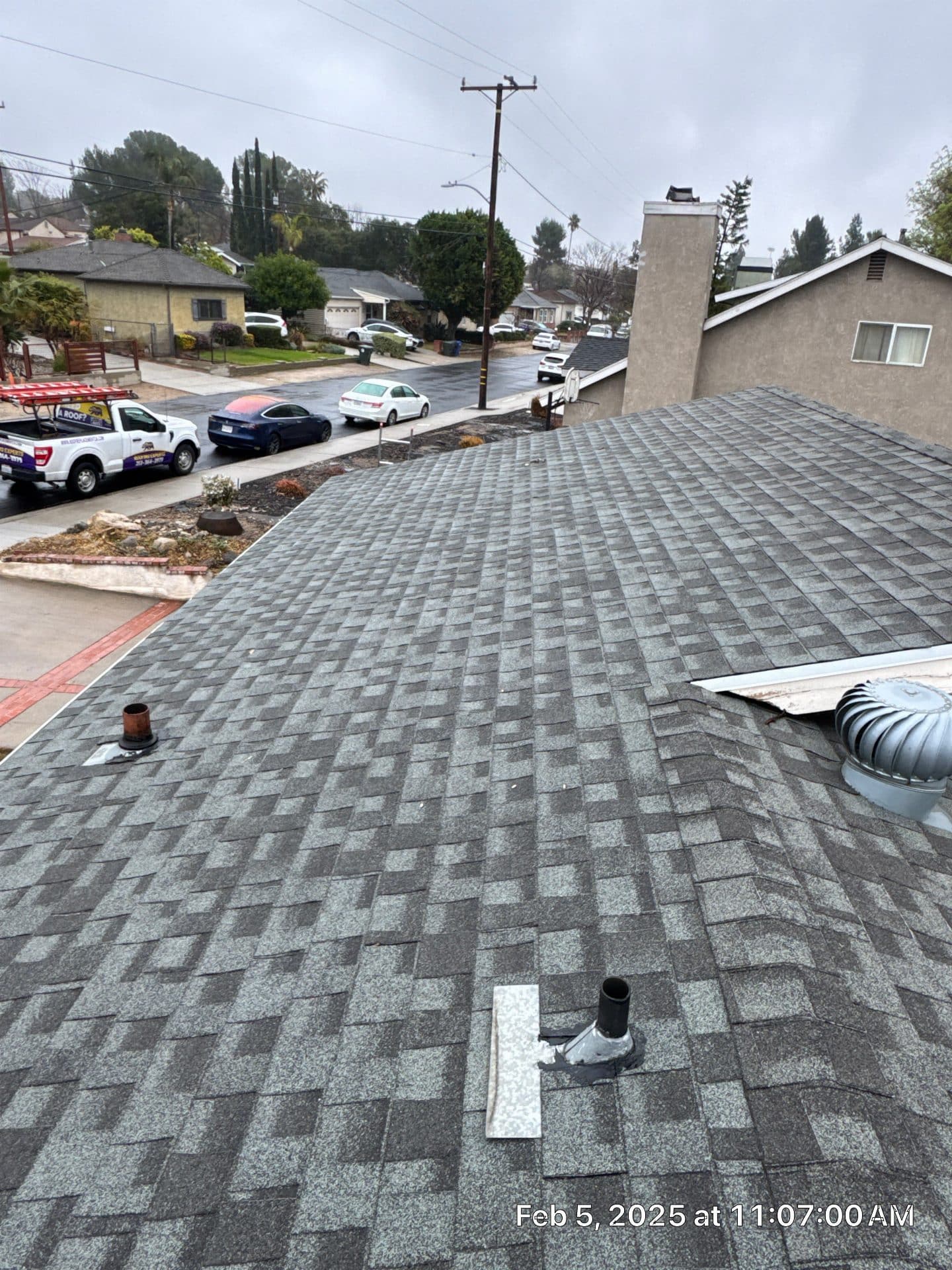 Gray asphalt shingle roof with pipe boot flashing and turbine vent — La Crescenta-Montrose — Roof Replacement Inc