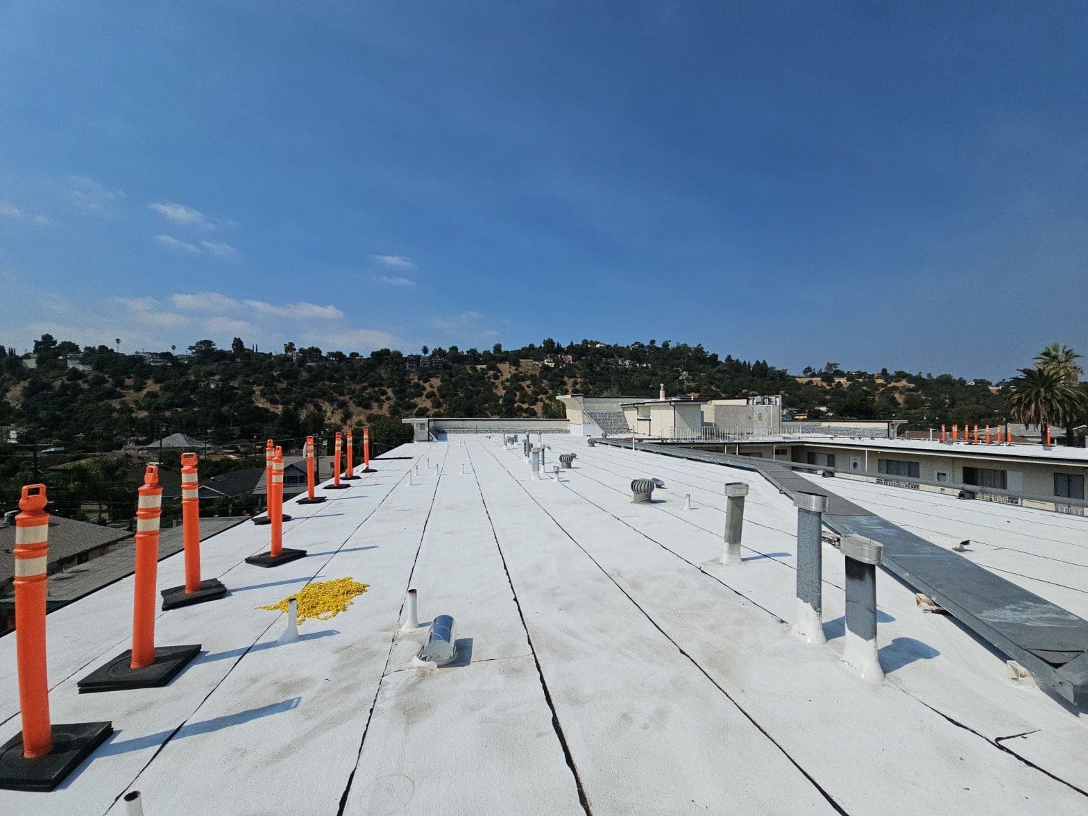DIY vs. Professional Summer Roof Care: A Cost-Benefit Analysis for Homeowners