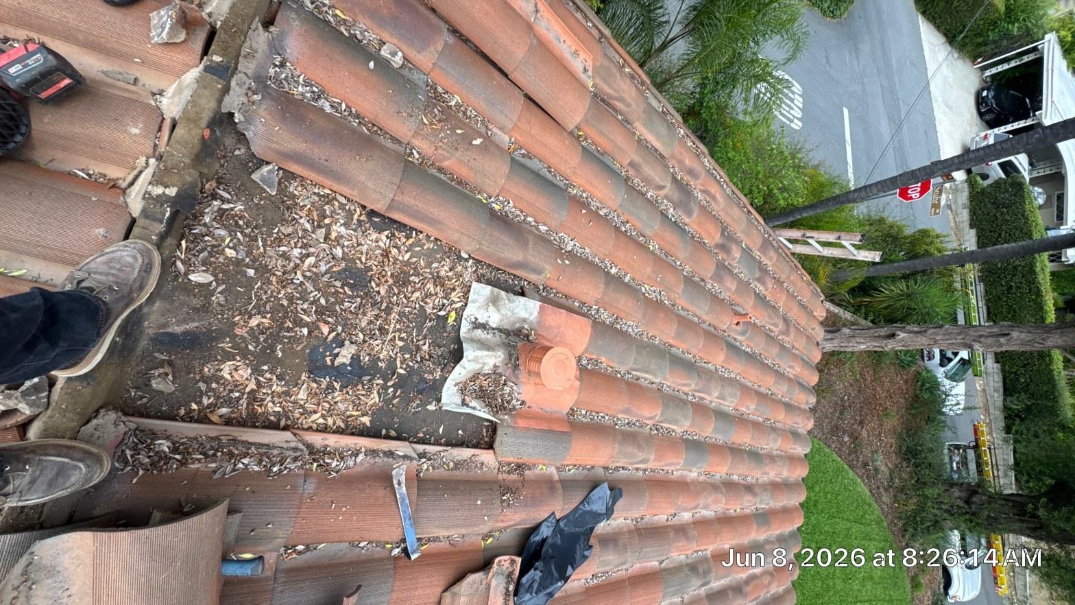 Residential clay tile roof in good condition ready for 2-year certification inspection in Southern California