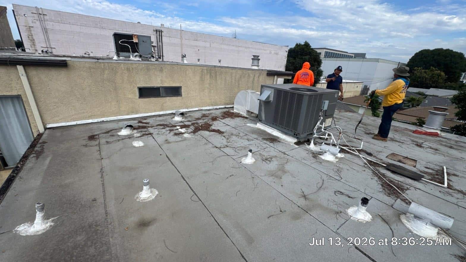 Completed torch down flat roof installation work at Roof Replacement Inc